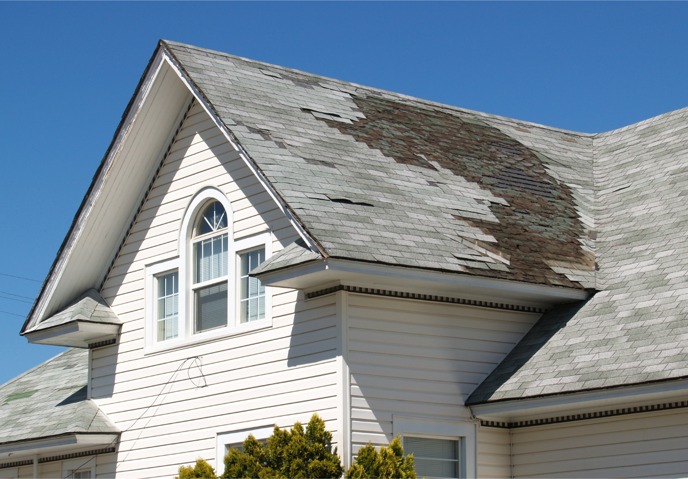 roof-inspections a house with damaged roof